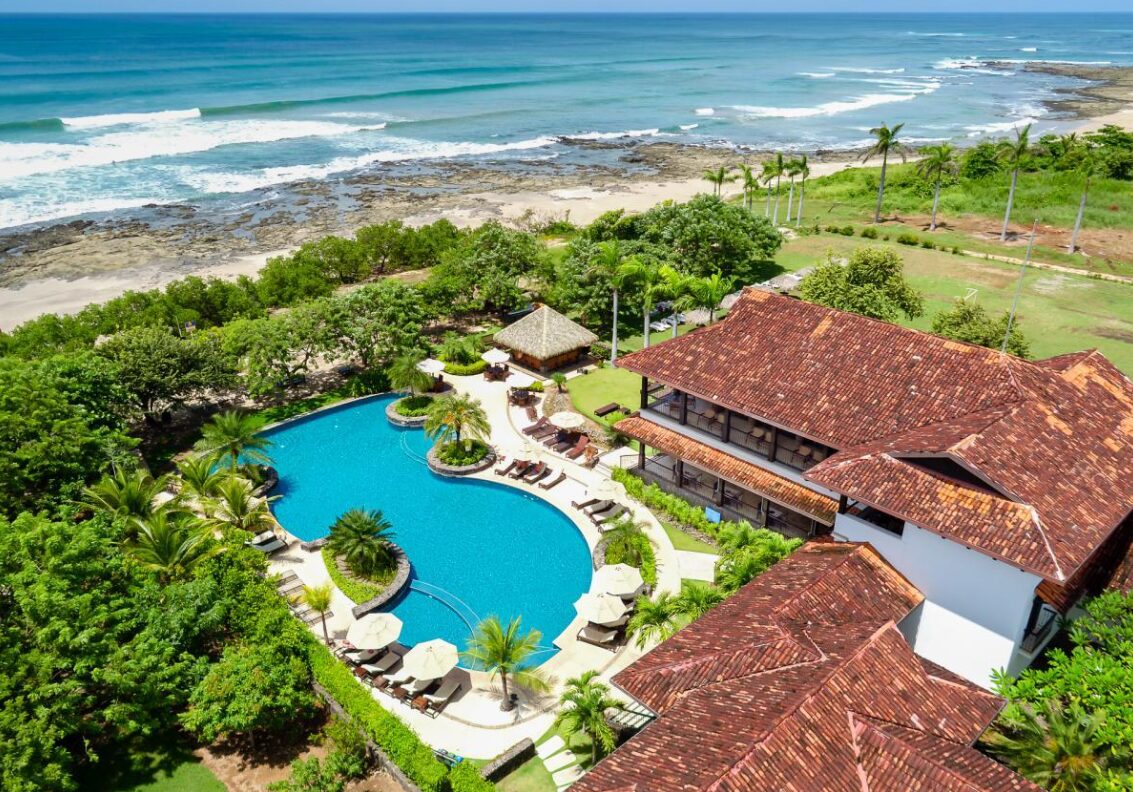 Beach club pool and clubhouse at a Guanacaste gated community