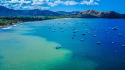 traditional fishing boats in Playas del Coco harbor