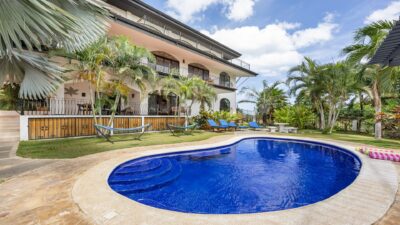 “Luxury vacation rental home in Costa Rica showcasing investment potential and rental income opportunities for expats