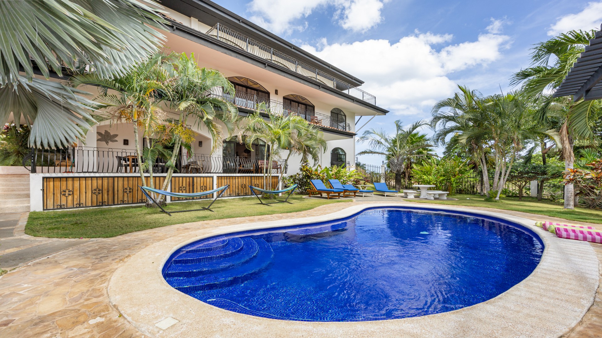 “Luxury vacation rental home in Costa Rica showcasing investment potential and rental income opportunities for expats
