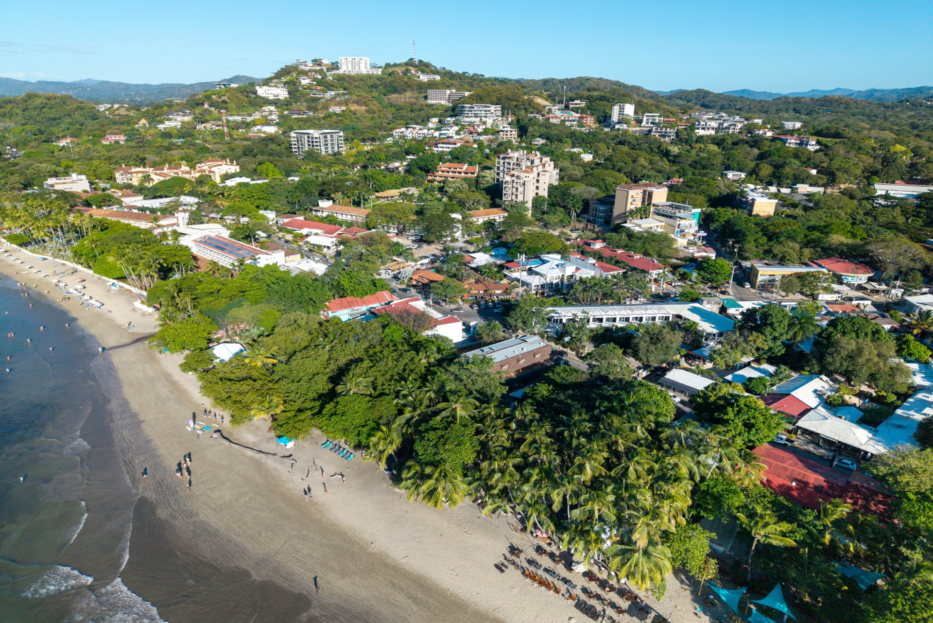 Aerial view of beachfront property along Playa Tamarindo, Costa Rica, where the town meets the Pacific